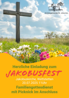 Kreuz auf einer Blumenwiese